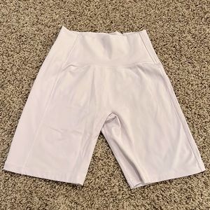 Alphalete Pulse Kinetic Short in the color lavender, size small